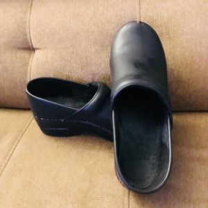 Woman’s Dansko Black Clogs
